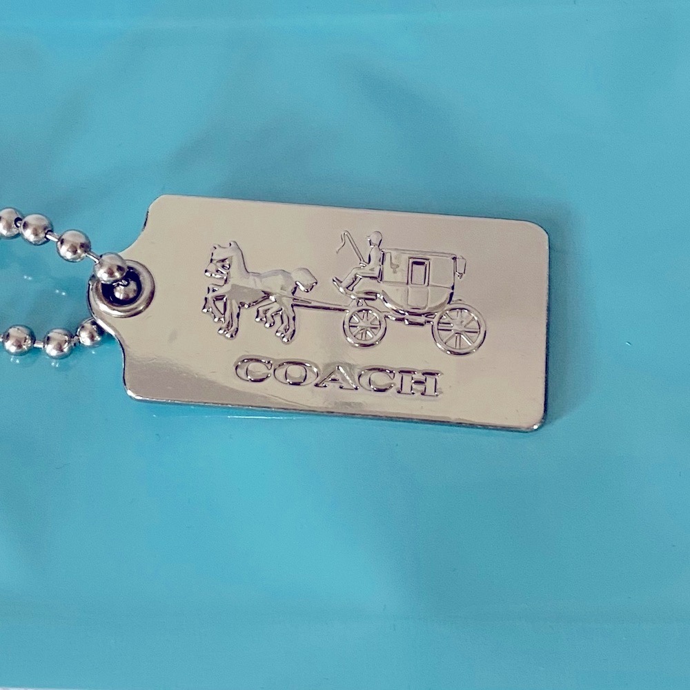 Auth Coach horse & carriage silver metal hangtag